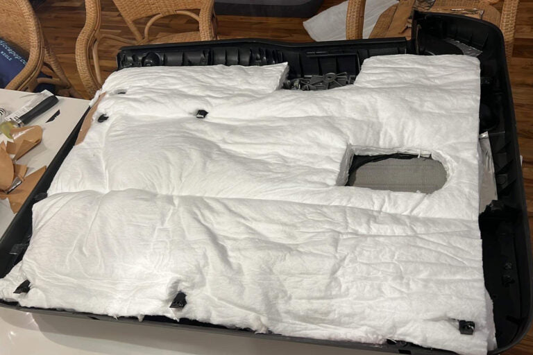 ResoNix Fiber Mat sound absorber for vehicles applied to the back of a trucks door panel.