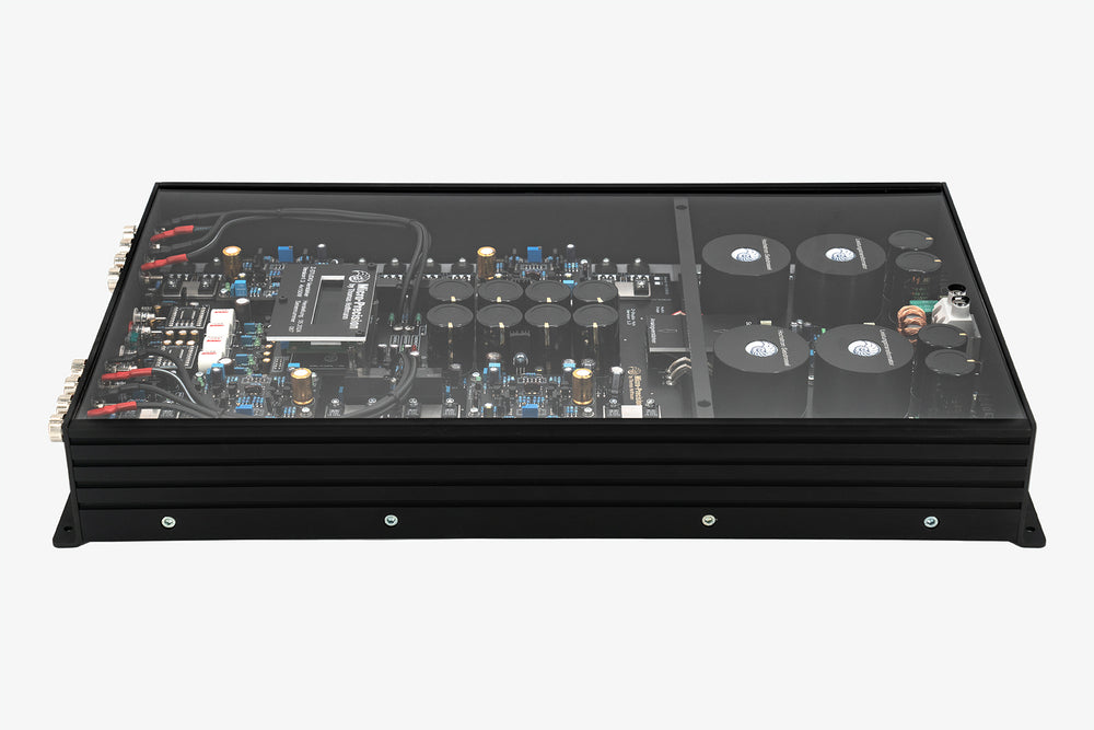 A Micro Precision Z-Studio 4c 4-channel car audio amplifier with visible electronic components, circuitry, and connectors on the top surface.
