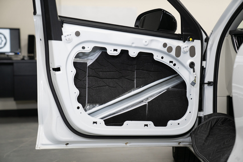 ResoNix Guardian installed onto the outer door skin to absorb outside road and tire noise as well as improve midbass speaker performance and output
