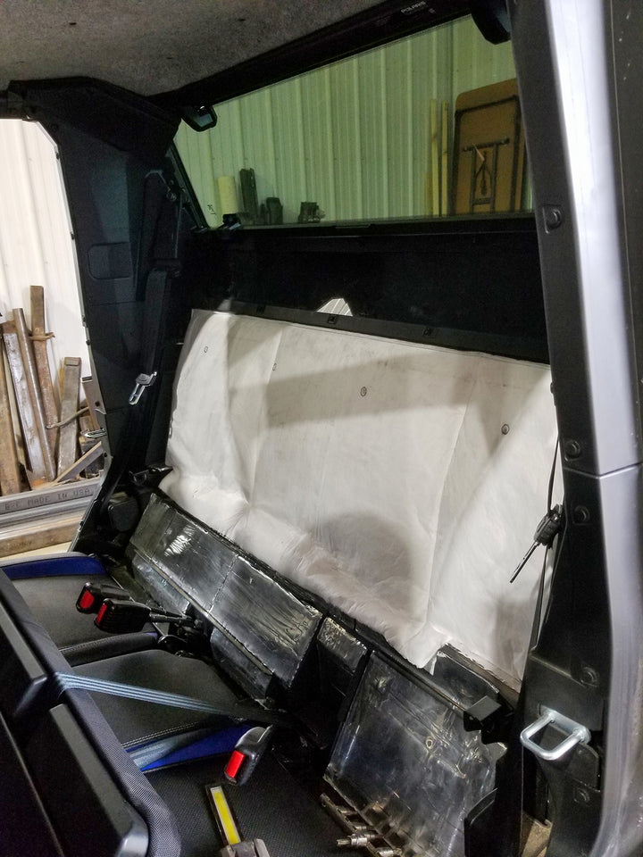 ResoNix Sound Solutions Fiber Mat Sound deadening and sound absorbing material installed onto the interior firewall of a Polaris Xpedition to reduce sound from the engine