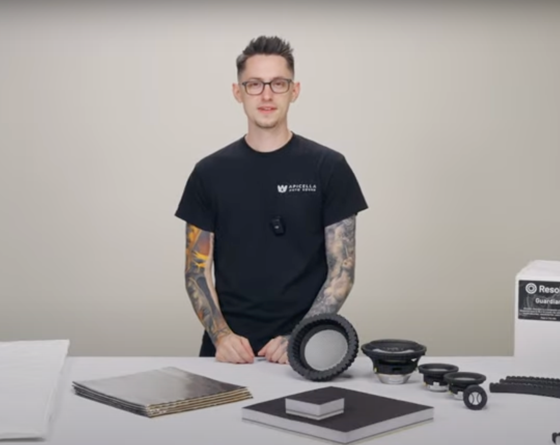 Nick Apicella of ResoNix Sound Solutions standing at a table of their various offerings