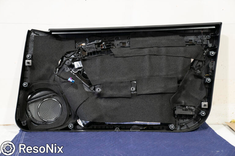 ResoNix CCF Decoupler Sound Deadening Foam applied to the back of a car door panel