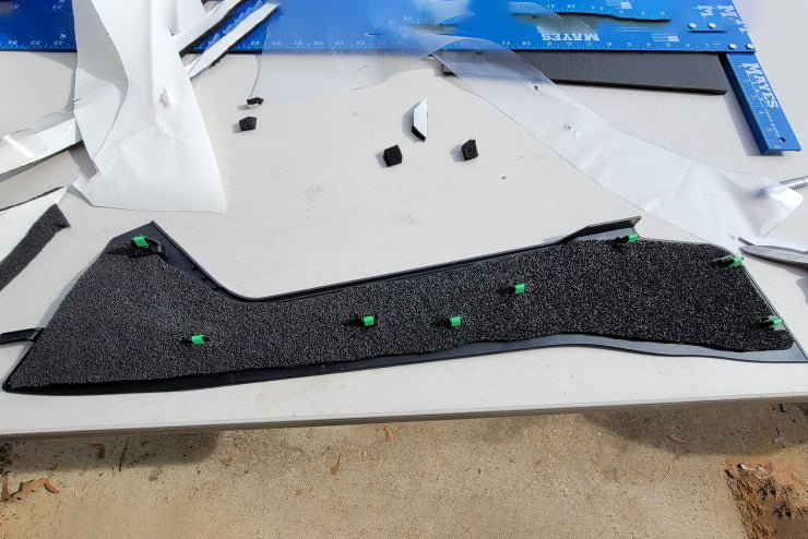 ResoNix CCF Decoupler Sound Deadening Foam applied to the back of a cars trim panel