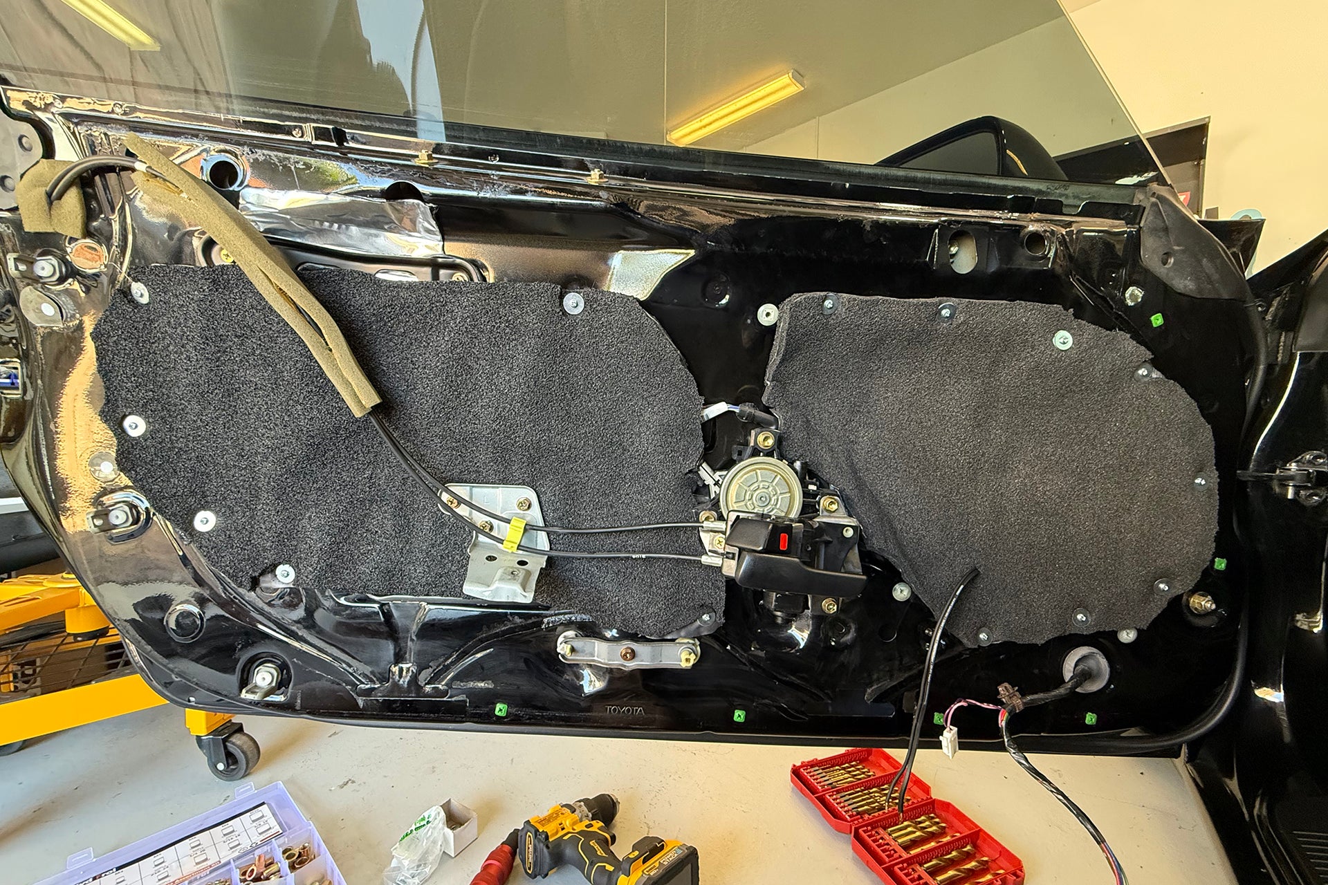 Toyota Supra with ResoNix Barrier installed onto the inner door skin to seal up the access holes of the door.