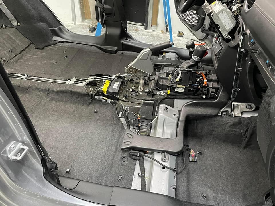 ResoNix Barrier installed and completely covering the floor of a vehicle with a stripped interior