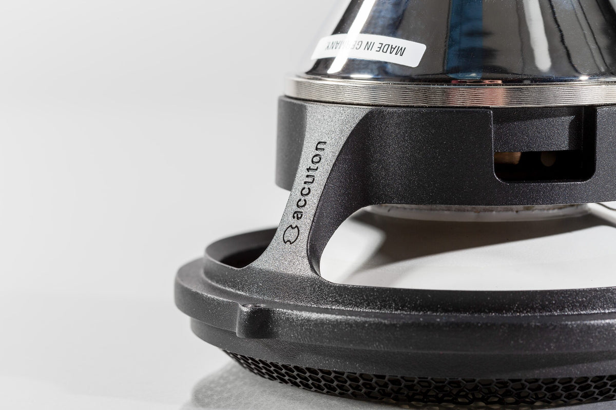 Close-up of an Accuton Automotive speaker cone, magnet, and the basket with the Accuton Automotive logo