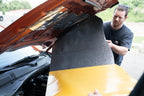 car hood being lined by someone with ResoNix Fiber Mat Silver sound absorber and sound insulation material