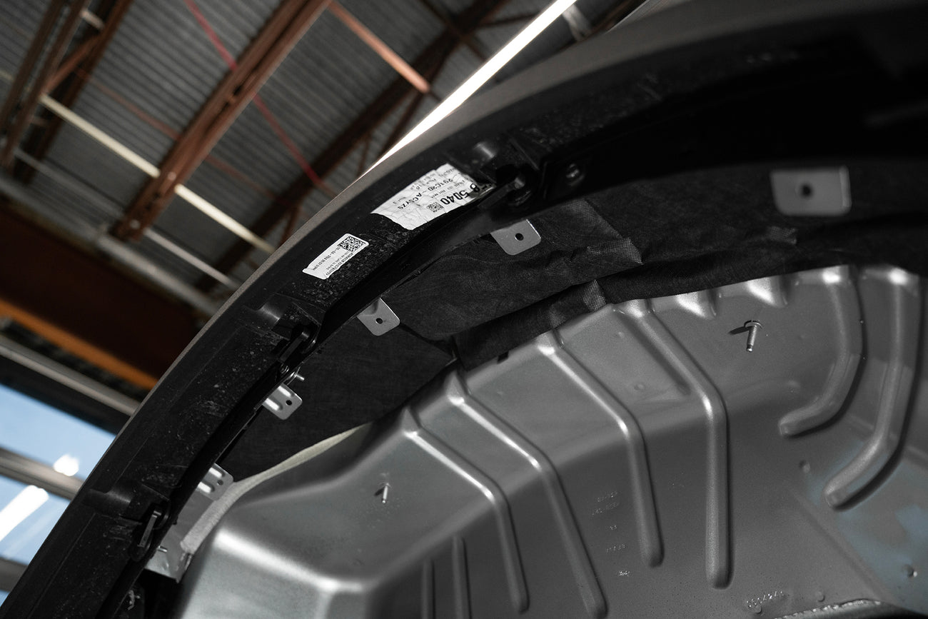 ResoNix Fiber Mat automotive sound absorption material installed into the wheel well of a vehicle