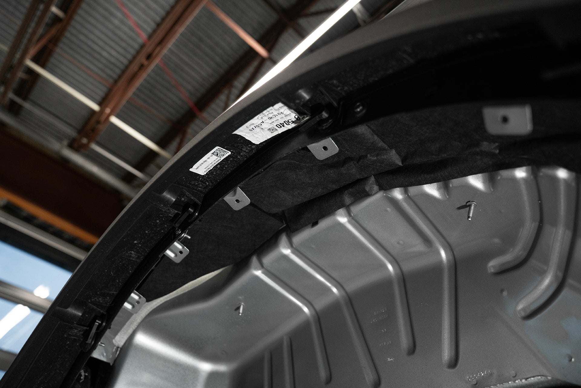 ResoNix Fiber Mat automotive sound absorption material installed into the wheel well of a vehicle