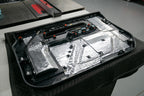 back side of a car door panel that has ResoNix CLD Squares sound deadener material applied to it