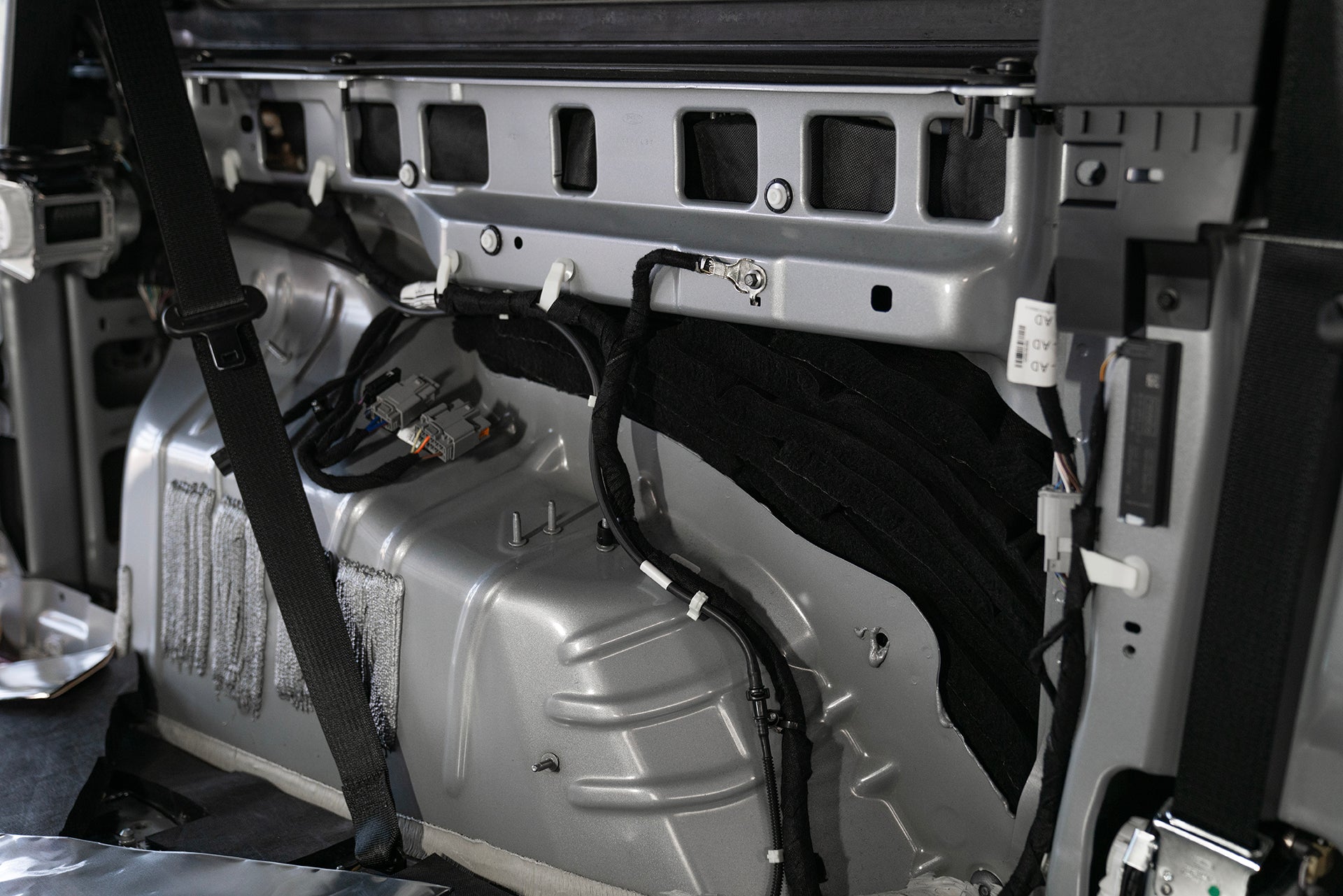 ResoNix Sound Solutions Fiber Mat Sound Absorber installed into the drivers side quarter panel of a Ford Bronco