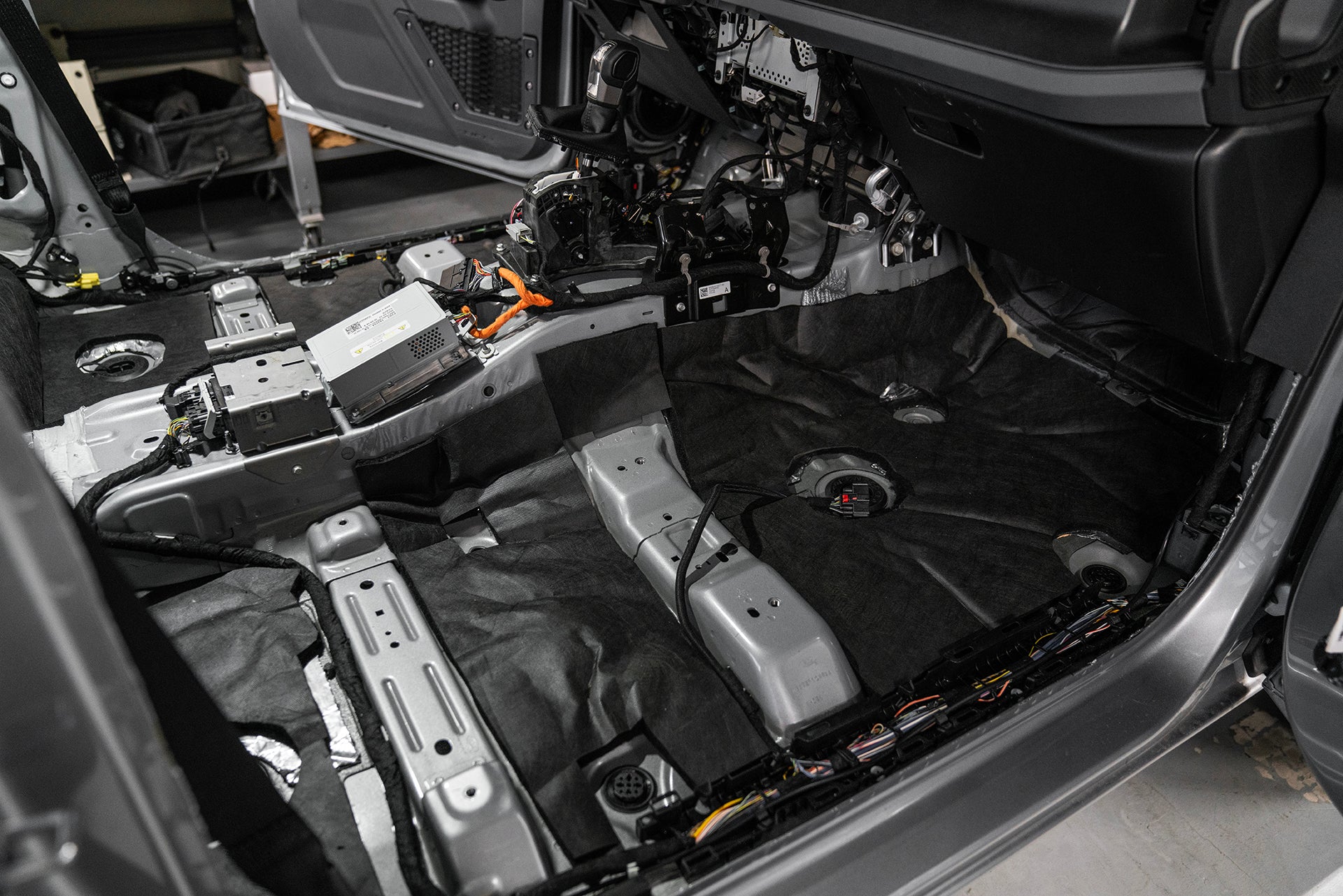 ResoNix Fiber Mat installed into the floor of a vehicle to absorb sound