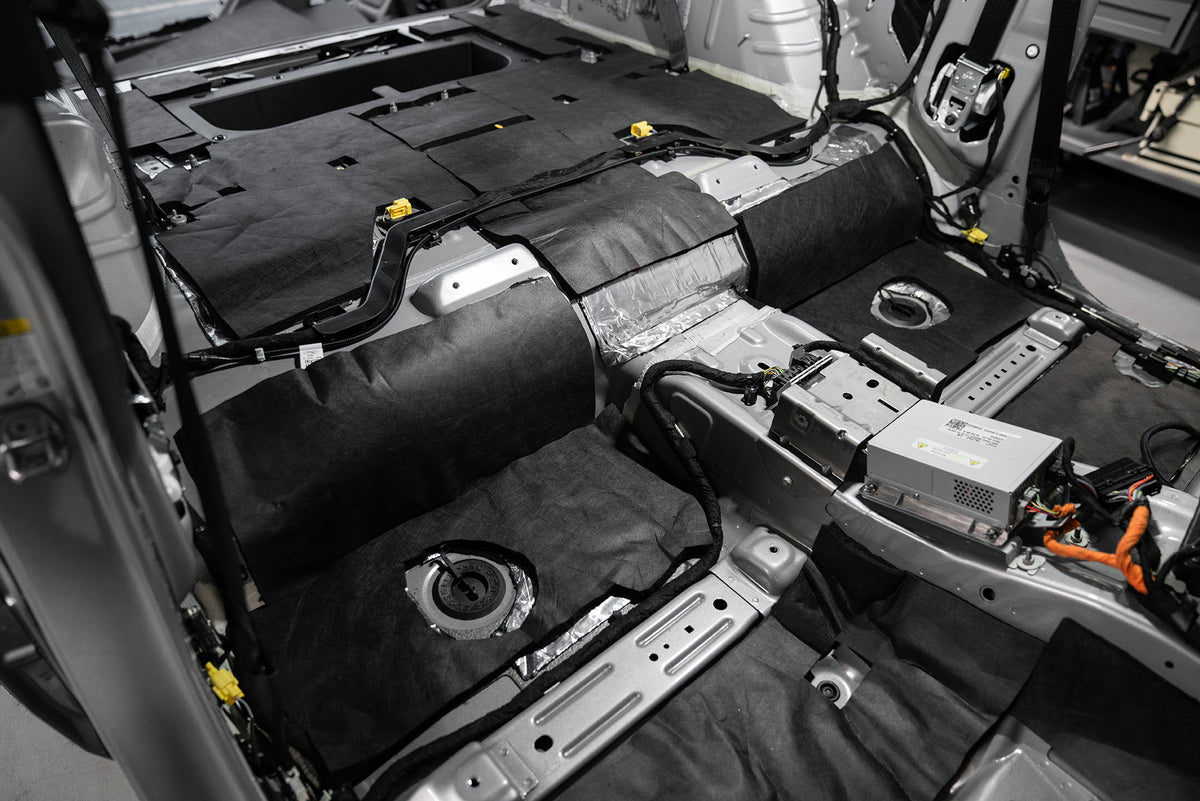 ResoNix Fiber Mat installed into the floor of a vehicle to absorb sound