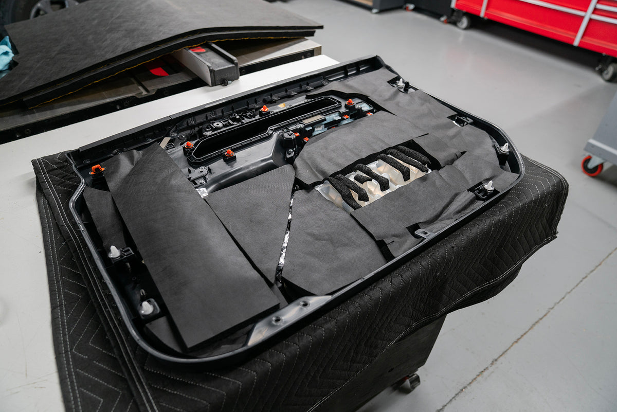 Ford Bronco with ResoNix Sound Solutions Fiber Mat installed onto the back of the door panel