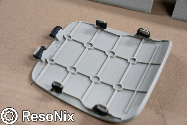 ResoNix Butyl Rope on clips of small automotive trim panel to prevent rattles