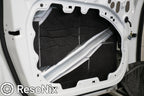 Car door with ResoNix CLD Squares automotive sound deadener and ResoNix Guardian sound absorption material installed on the outer door skin