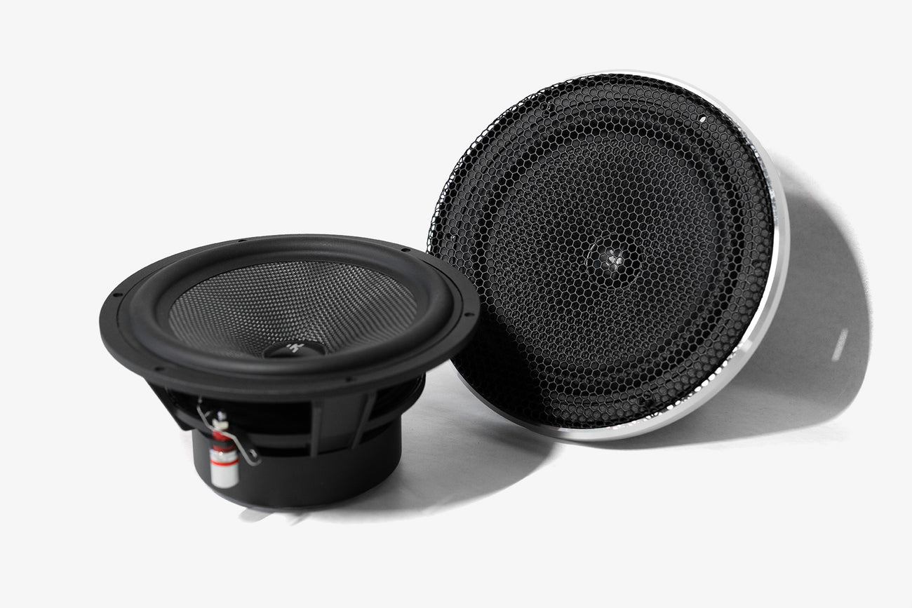 a pair of Karma Mobile Audio Allure 6 6.5" car audio midbass speakers, one of which has the grille installed