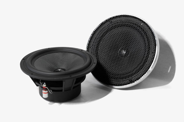 a pair of Karma Mobile Audio Allure 6 6.5" car audio midbass speakers, one of which has the grille installed