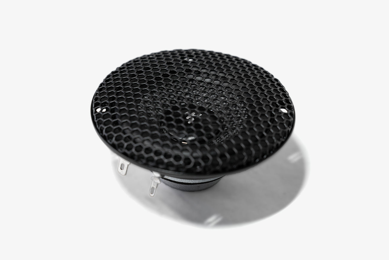 A single Karma Mobile Audio Aspect 3 three inch midrange speakers with its black grille