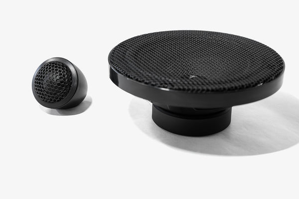 Karma Mobile Audio Aspect 6.1 6.5" component set of car audio speakers with the tweeter in its supplied mounting pod, and the midbass with its grille installed.