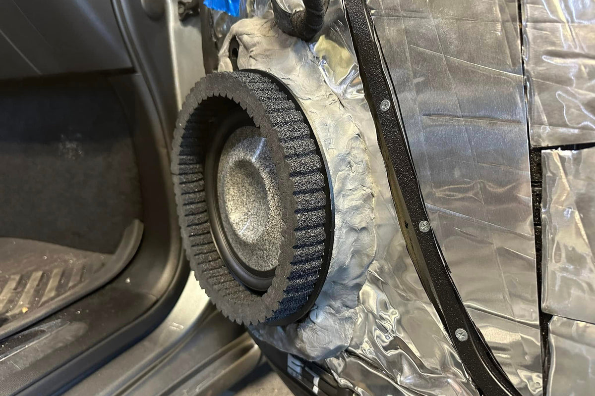 ResoNix Sound Solutions CCF Strip installed around focal utopia 8wm midbass speaker on a GMC Sierra inner door skin