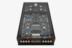 A Micro Precision Z-Studio 4c 4-channel car audio amplifier with visible electronic components, circuitry, and connectors on the top surface.