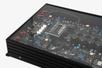 A close up shot of a Micro Precision Z-Studio 4c 4-channel car audio amplifier with visible electronic components, circuitry, and connectors on the top surface.