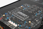 Close up of the display for the A Micro Precision Z-Studio 4c 4-channel car audio amplifier with visible electronic components, circuitry, and connectors on the top surface.