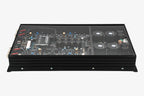 A Micro Precision Z-Studio 4c 4-channel car audio amplifier with visible electronic components, circuitry, and connectors on the top surface.