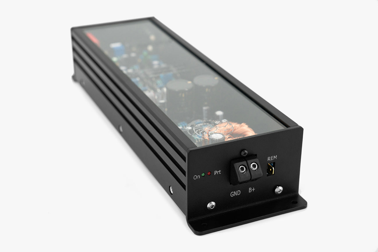 Micro Precision 5-Series two channel high end car audio amplifier with a close up focus on the power and ground terminals on the side panel