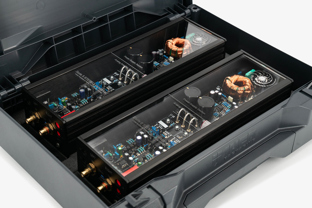 a pair of Micro Precision 5-Series two channel high end car audio amplifiers in their shipping case