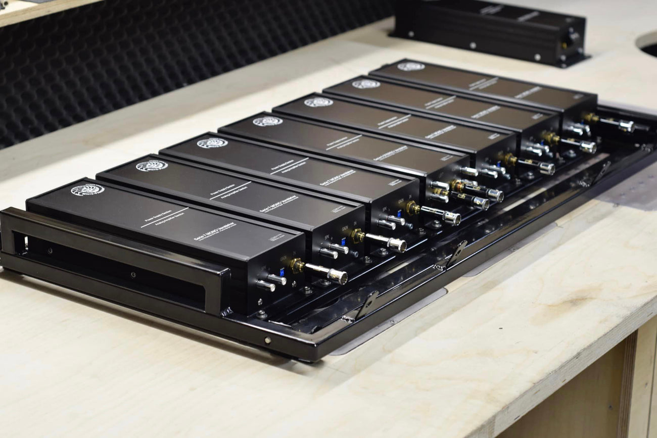 Micro Precision 7-Series mono amplifiers lined up on the amplifier rack for PS Sounds Mercedes demo car