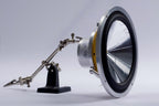 side angle showing the magnet, basket, cone, and speaker terminals of a Micro Precision Z-Studio 170 6.5" car audio midbass speakers being held up with soldering helping hands
