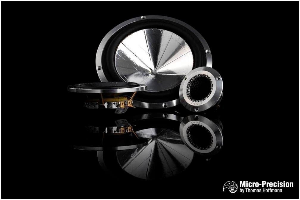 Micro Precision Z-Studio tweeters, midrange, and midbass driver in dramatic lighting against a black background