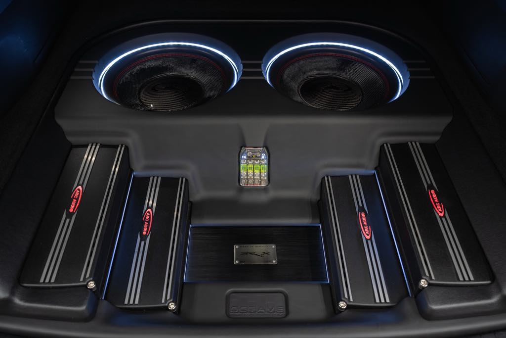 Custom Car Audio System in the trunk of miguel rios of waveform tuning, a travelling car audio dsp tuning service, demo car. A Mazda CX90