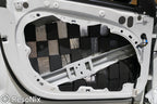 Car door that is treated with ResoNix CLD Squares sound deadening mat and Blackhole Tiles sound absorber