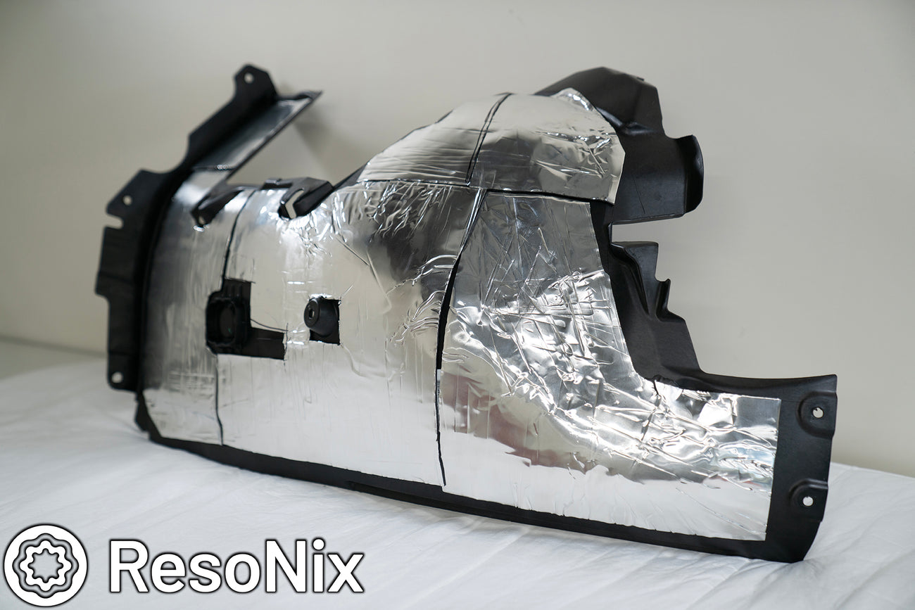ResoNix CLD Squares sound deadener installed onto the fender liner of a vehicle