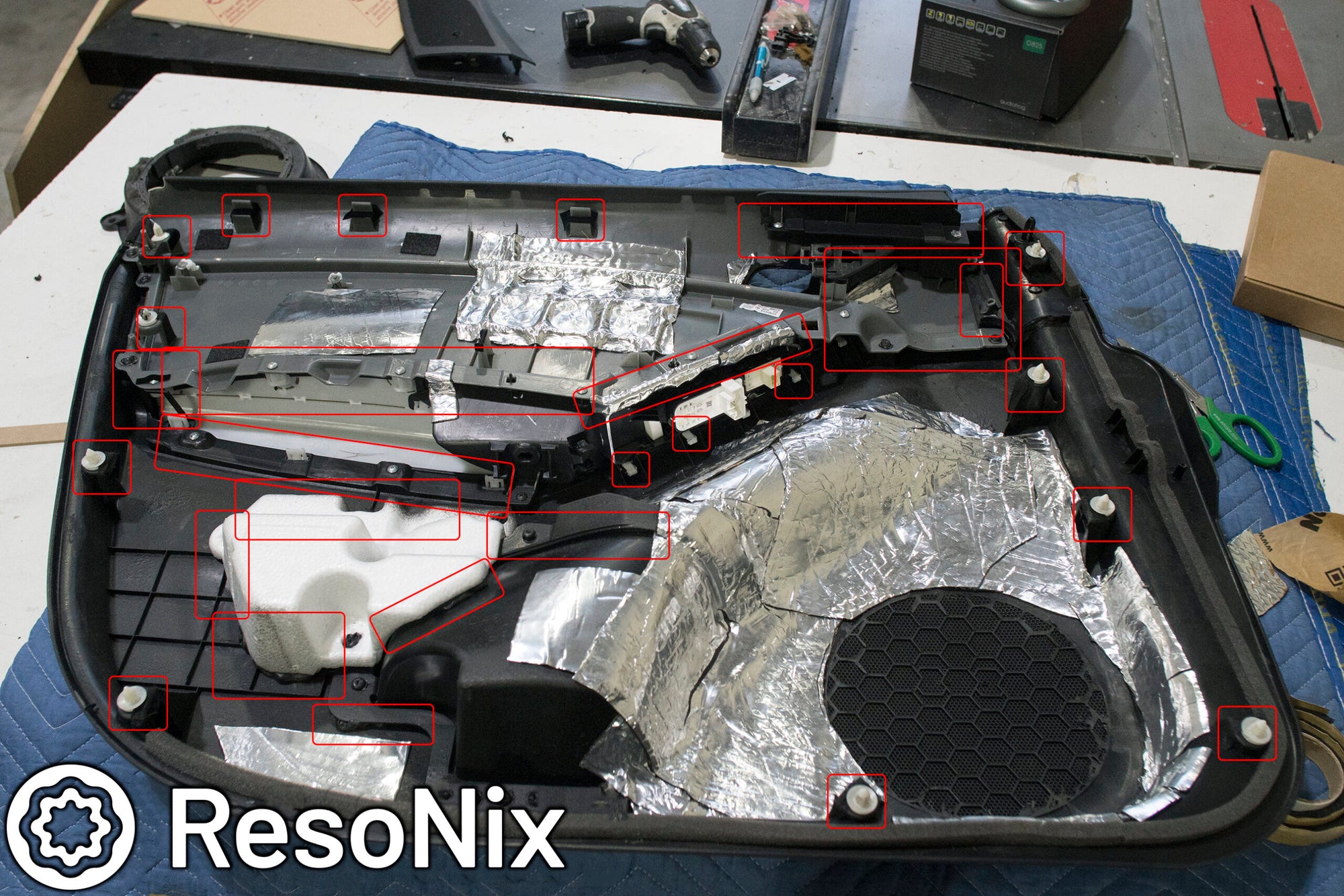 ResoNix Butyl Rope holding a door panels overlapping layers and door panel clips in place to prevent rattles and buzzes