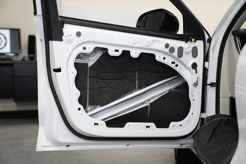 ResoNix Guardian installed onto the outer door skin to absorb outside road and tire noise as well as improve midbass speaker performance and output