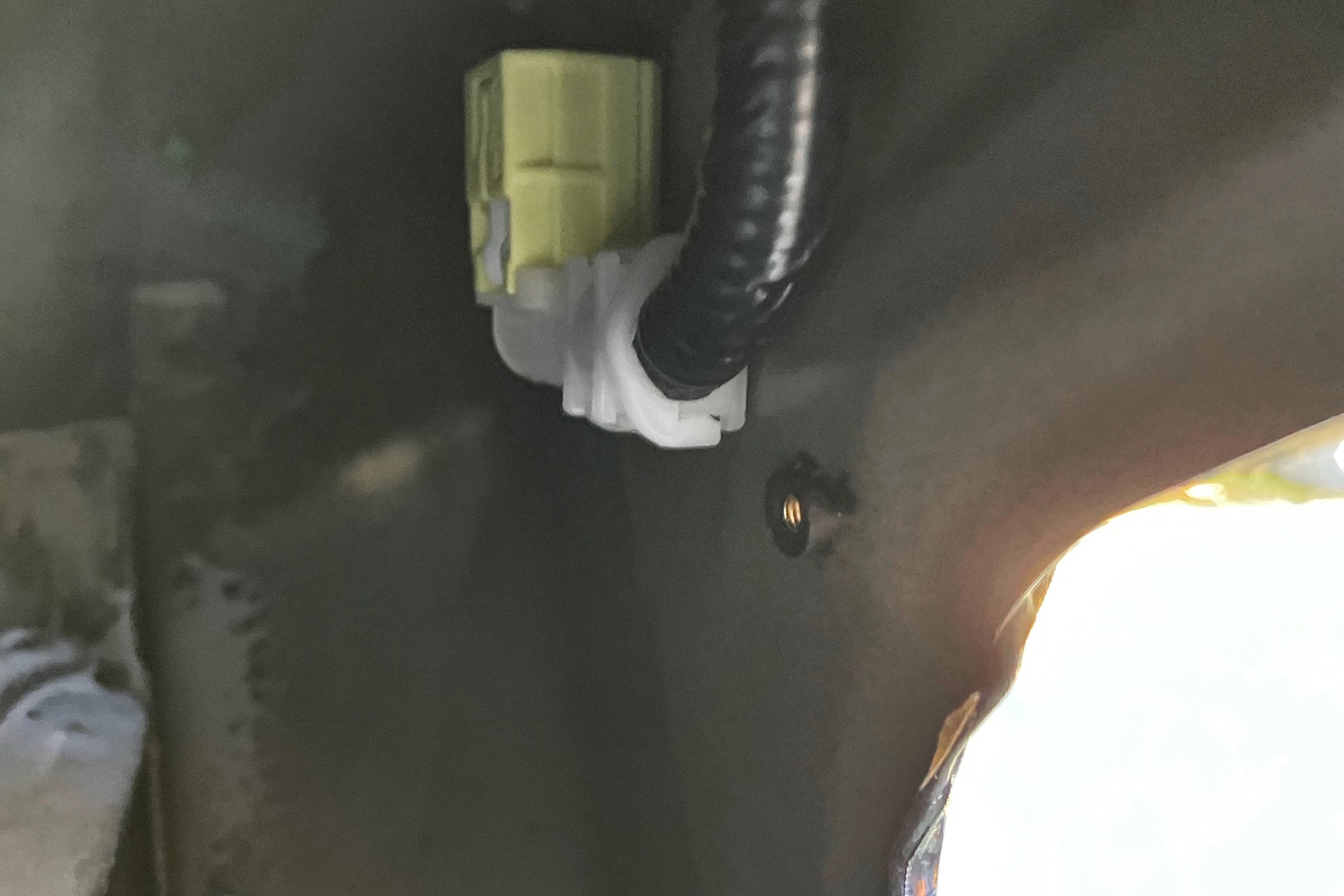 Well nut installed onto a cars inner door skin