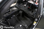 ResoNix Barrier installed and completely covering the floor of a vehicle with a stripped interior