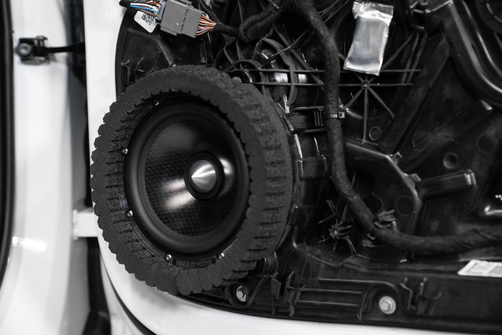 ResoNix Sound Solutions CCF Strips Foam Rings Installed around midbass speaker in a car door