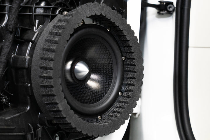ResoNix Sound Solutions CCF Strips Foam Rings Installed around midbass speaker in a car door