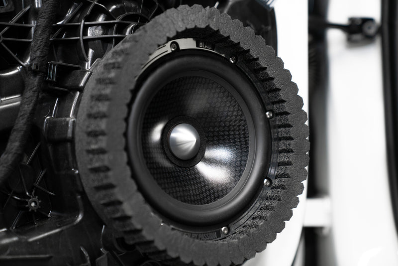 ResoNix Sound Solutions CCF Strips Foam Rings Installed around midbass speaker in a car door