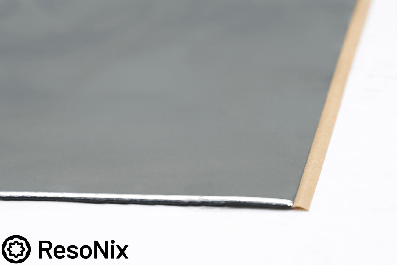 close up of the corner of ResoNix Lite CLD Rectangles sound deadener mats for cars