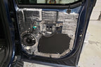 Car door interior with speaker and ResoNix CLD Squares soundproofing material