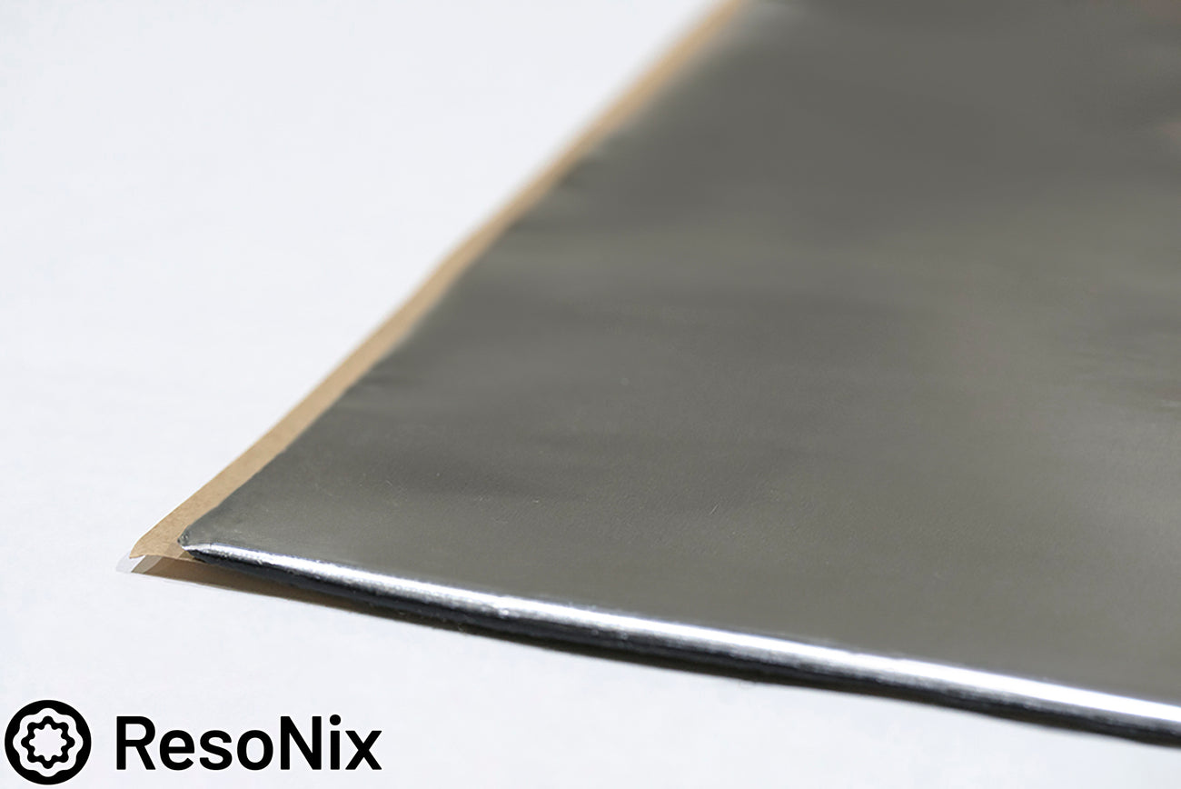 close up of the corner of ResoNix CLD Squares sound deadener mats for cars