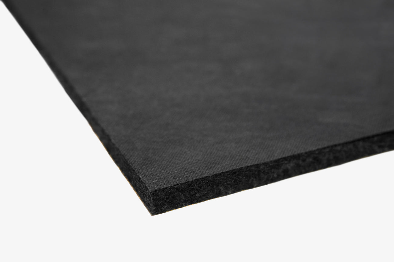 Close up of the corner of ResoNix Fiber Mat Black Edition automotive sound absorber material