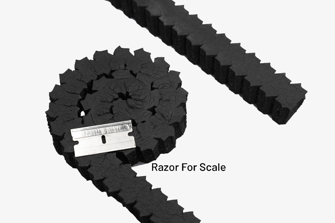 ResoNix Sound Solutions Fast Rings to couple speakers to panels and grille openings - top view rolled up with razor for scale