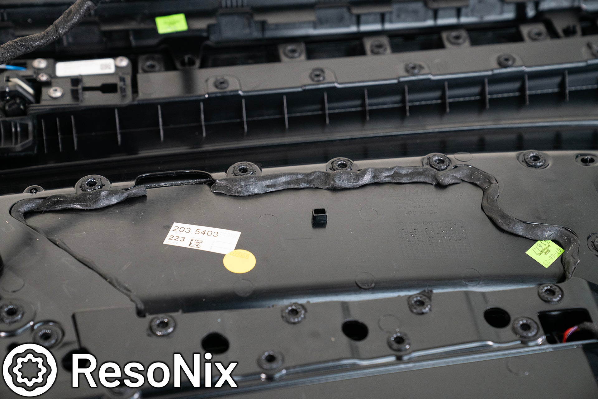 ResoNix Sound Solutions Butyl Rope gasketing tape material used on a Porsche 911 GT3 Touring to reduce rattles of the door panel